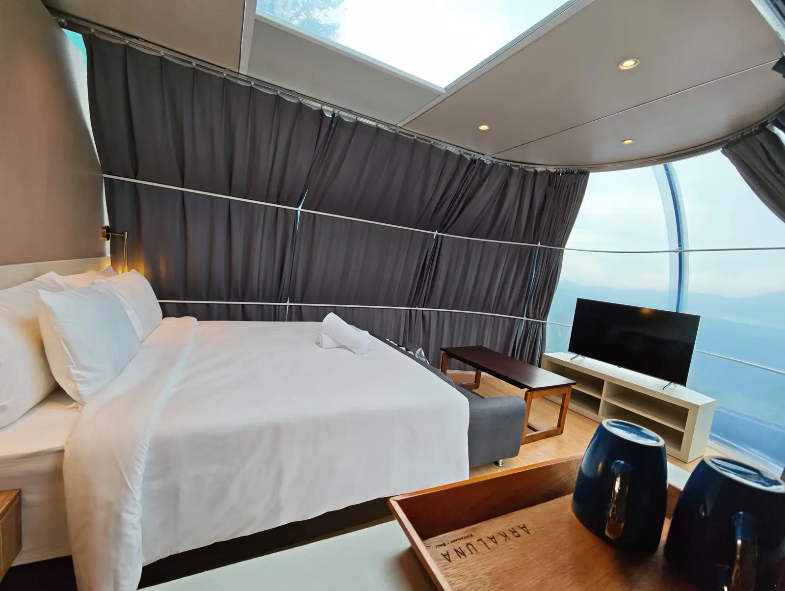 Bright bedroom inside Crystal Nest Suites at Arkaluna in Kintamani.