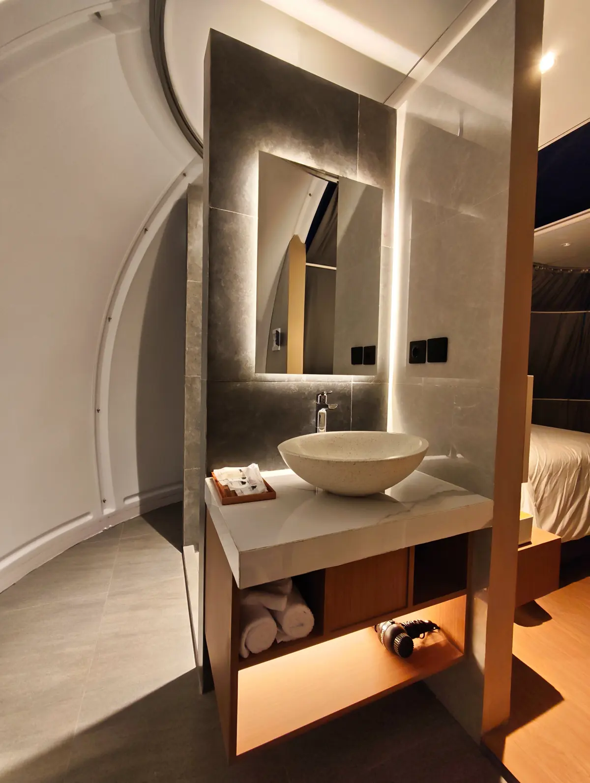 Clean bathroom vanity inside Crystal Nest Suites at Arkaluna.